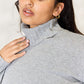 Heimish Full Size Turtleneck Long Sleeve Slit Sweater